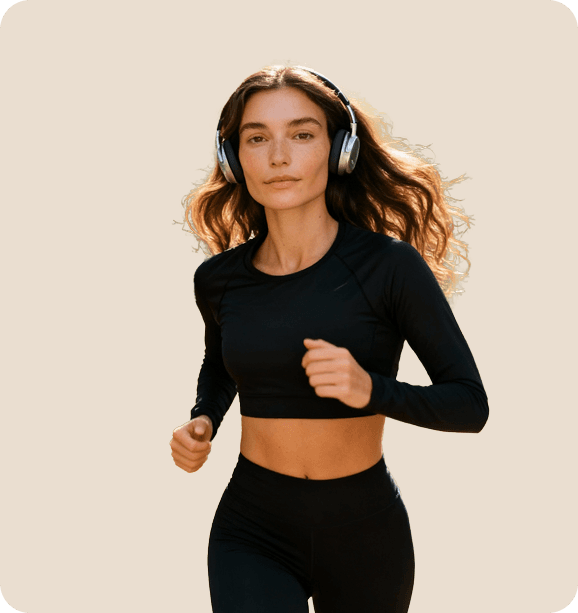 Runner tying bright orange shoe on city sidewalk, wellness and telemedicine support offering preventive healthcare lifestyle care